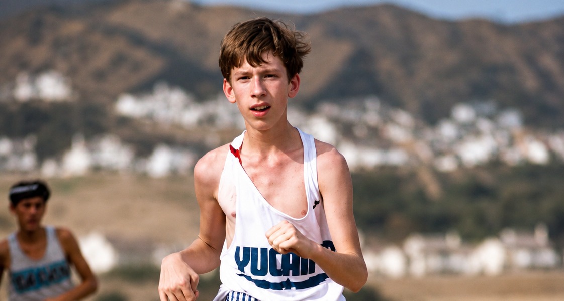 Craig Hindall running in a high school cross-country race during his freshman year